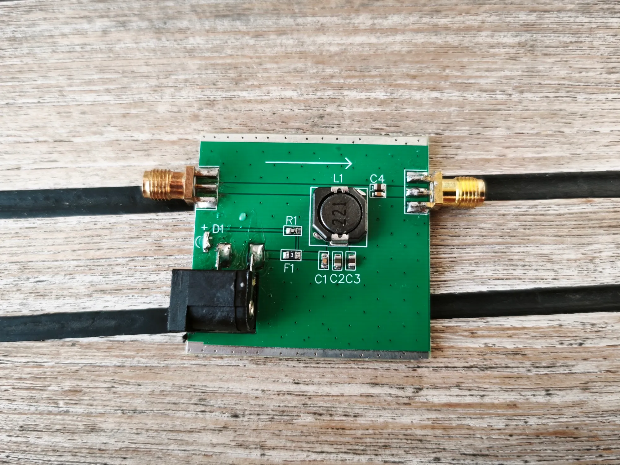 The opened Bias-T module, showing the fuse F1, the choke L1 and the indicator LED D1.